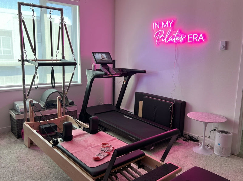 Modern Pilates Studio Interior with Custom LED Neon Sign