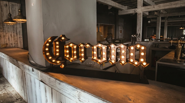 Essential tier vinyl sign example - Neon Brothers