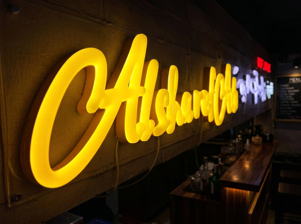 Elite tier vinyl sign example - Neon Brothers